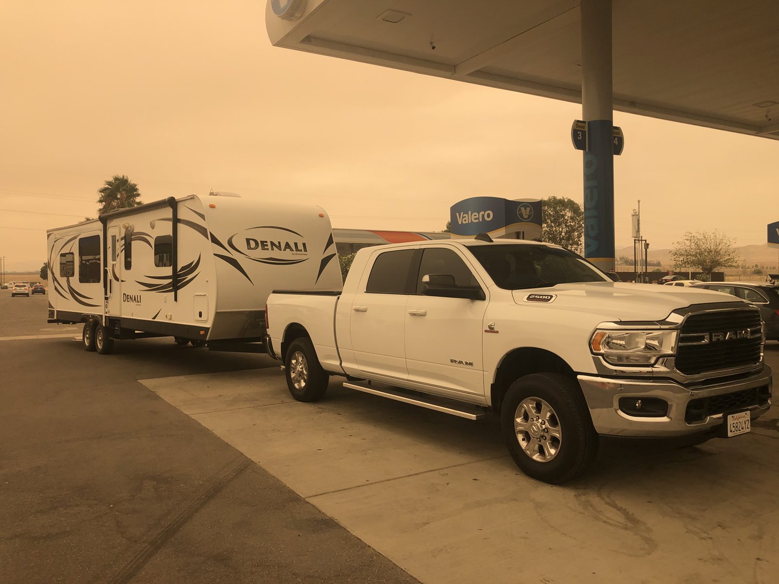 Ram pickup tow vehicle and travel trailer bought together in one deal in California