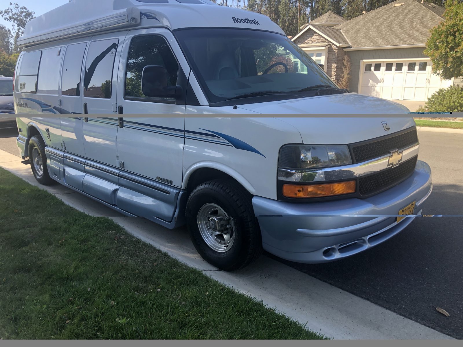 Chevy Class B camper van bought for cash in a California neighborhood driveway